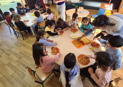 Children enjoying a healthy snack at a small table