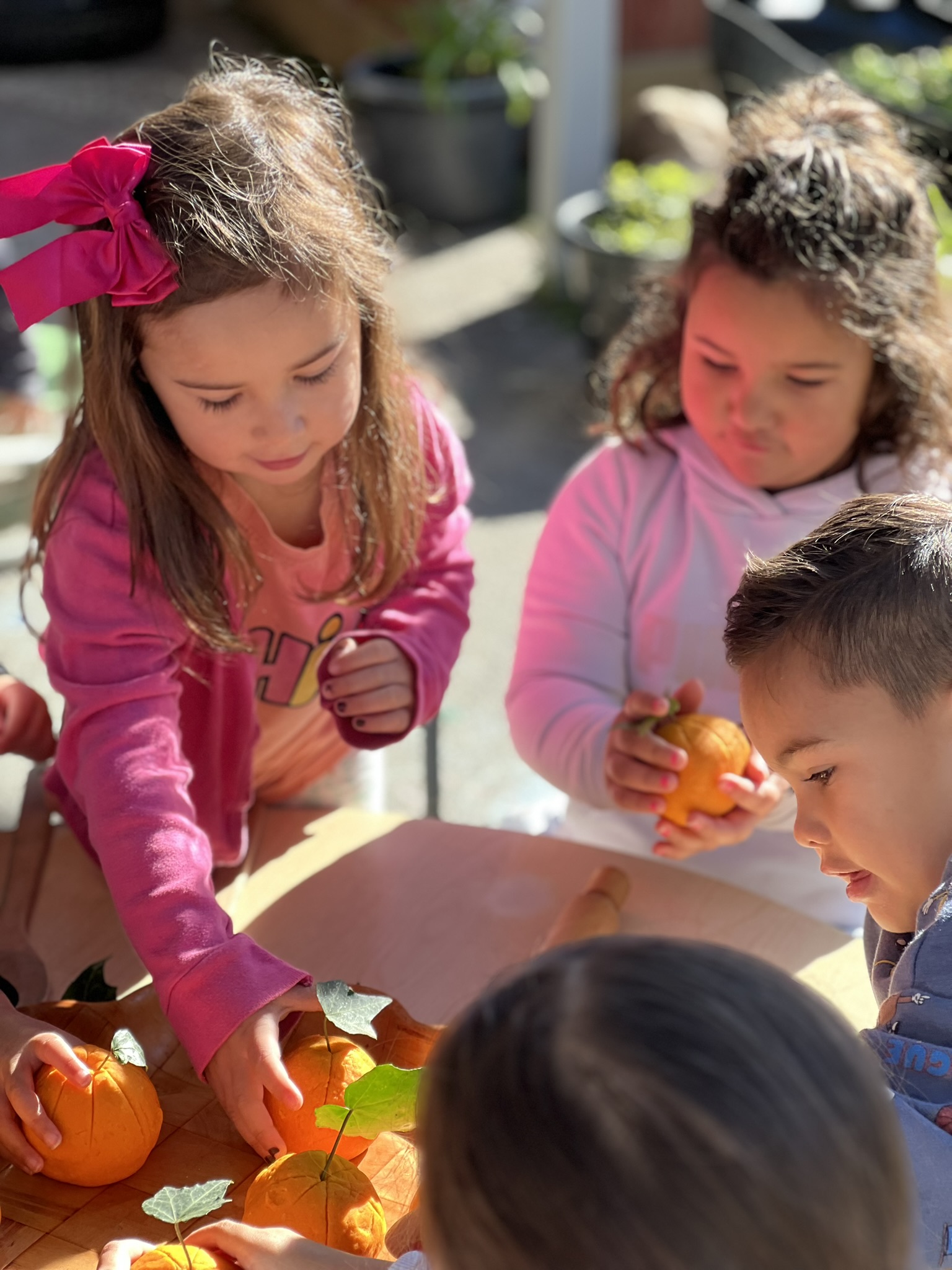Children exploring a Koru Kids learning activity