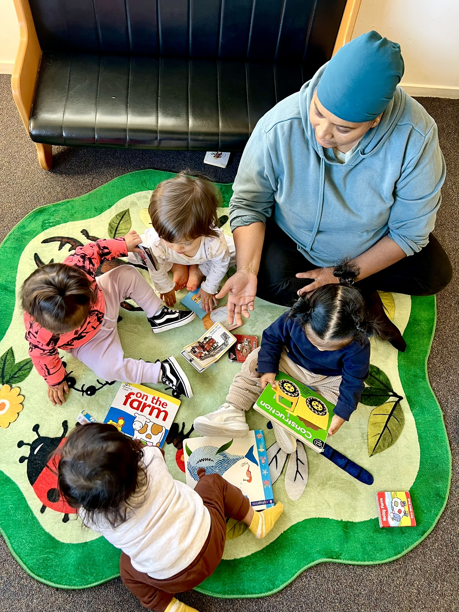 Children engaged in creative learning at Koru Kids