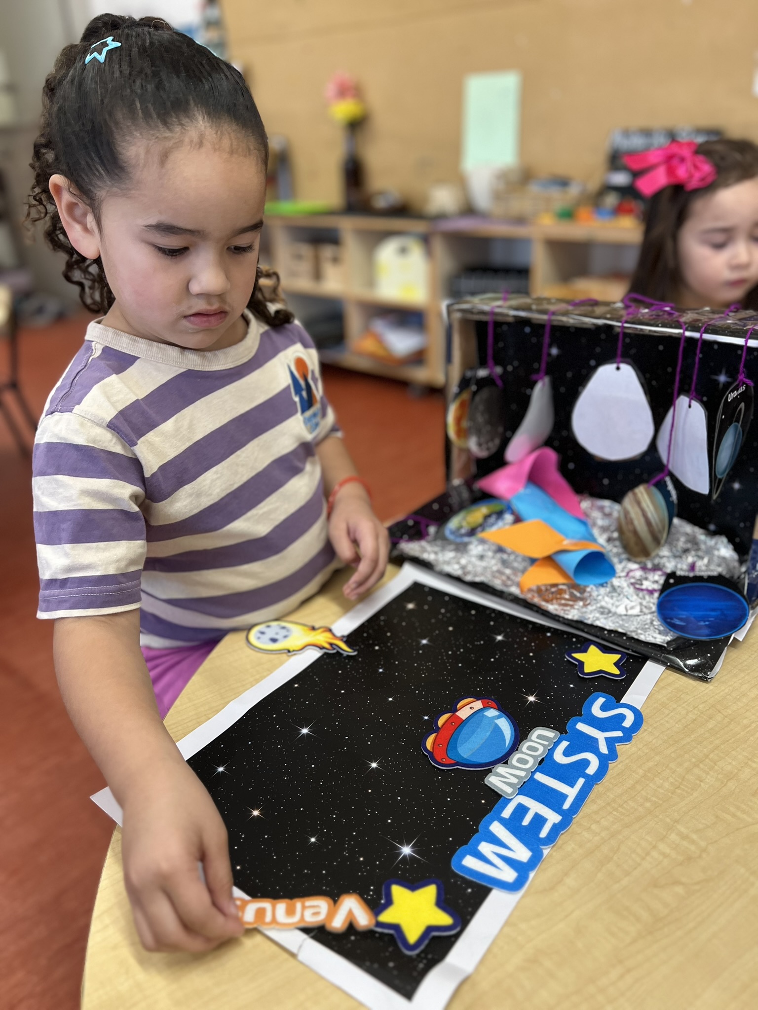 Children playing together in a Koru Kids learning space